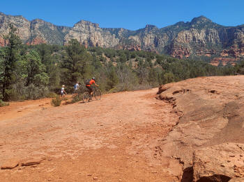 Junction of Hog Wash and Broken Arrow Trail - Rock Plateau with Bikers