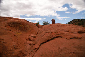 View of the top of the tail and the cairm makring the trail's end. 