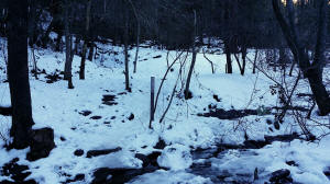Opposite side of first stream crossing